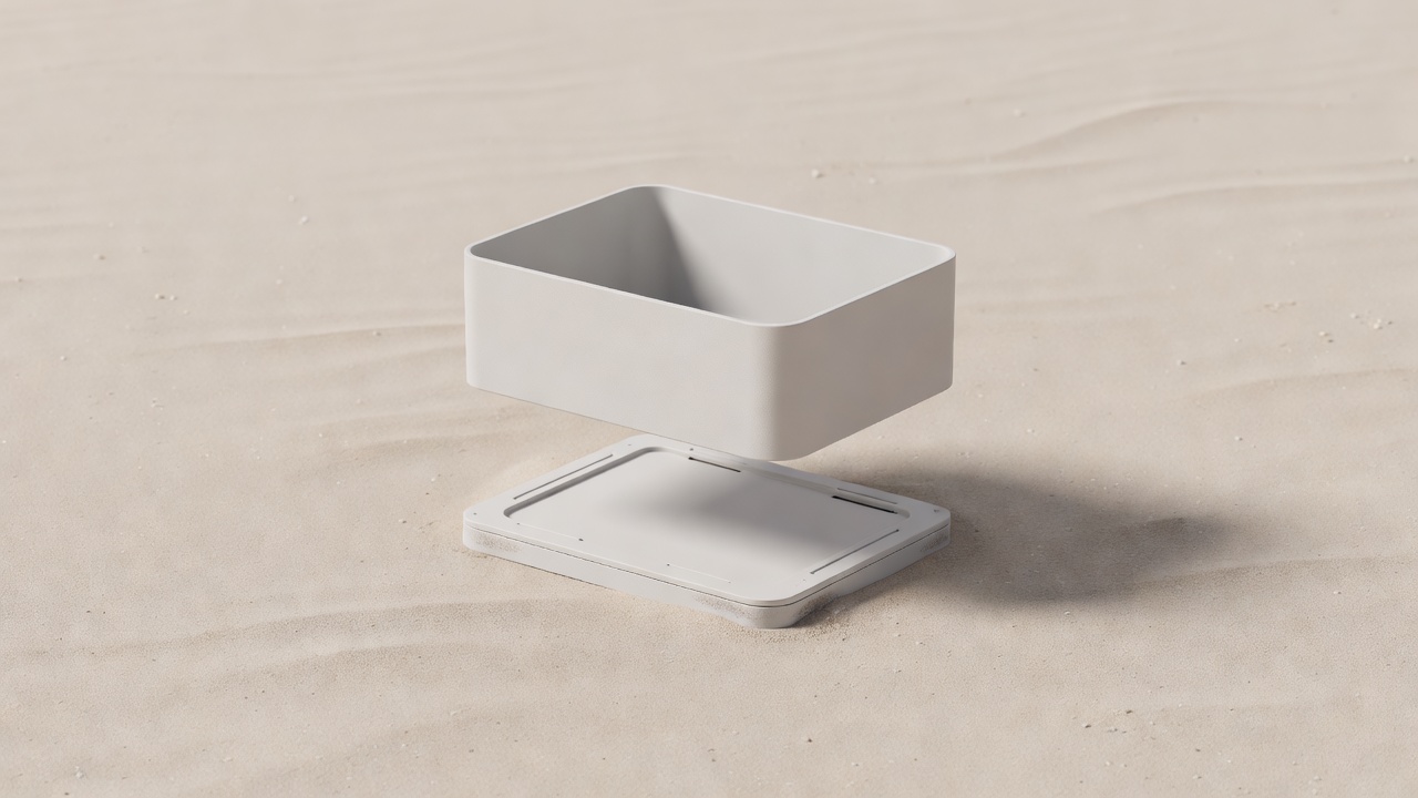 Soft-lit removable storage box lifted above a separate mounting plate on a plain sand background